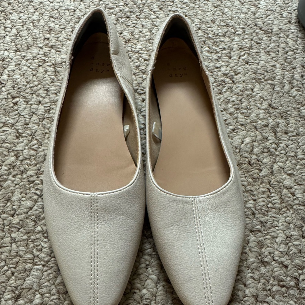 Off white modest flats